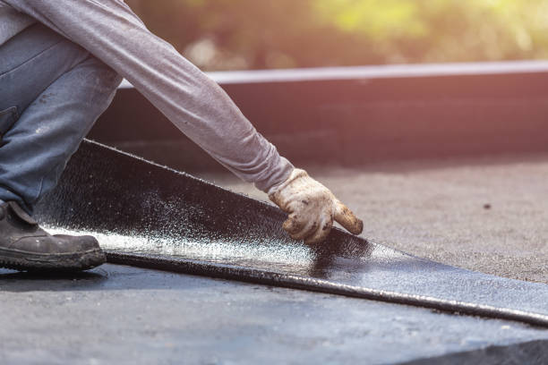 Professional Basement Waterproofing technician working in Kelso, TN